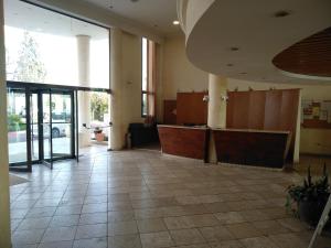 a lobby of a building with a reception desk at Shoresh mountain in Shoresh