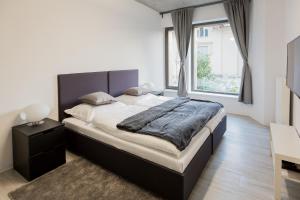 Postel nebo postele na pokoji v ubytování Exclusive penzion Viva Residence