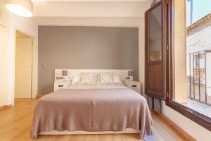 Posteľ alebo postele v izbe v ubytovaní Beautiful Apartment in Abat Street by Batuecas