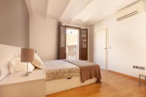 Posteľ alebo postele v izbe v ubytovaní Beautiful Apartment in Abat Street by Batuecas
