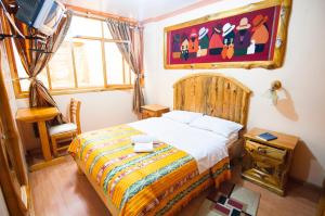 Postel nebo postele na pokoji v ubytování Hotel Santafe Inn