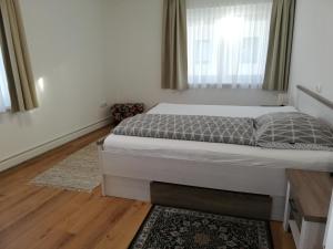 Łóżko lub łóżka w pokoju w obiekcie Ferienwohnung Schmied 3