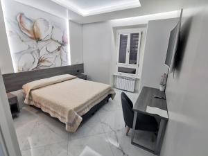 Postel nebo postele na pokoji v ubytování Hotel Valentino Palace