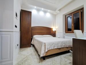 Postel nebo postele na pokoji v ubytování Hotel Valentino Palace