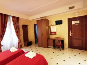 TV a/nebo společenská místnost v ubytování Hotel Valentino Palace