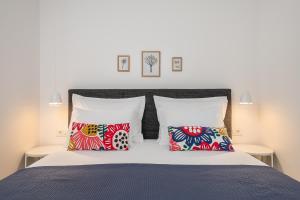 Posteľ alebo postele v izbe v ubytovaní Apartments Villa Maria