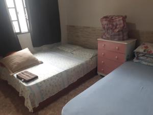 Krevet ili kreveti u jedinici u objektu Casa de praia P Grande