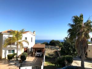 a villa with a view of the ocean at Amathousia Villa with private pool and sea view in Pissouri