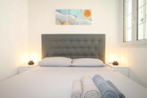 A bed or beds in a room at Villetta Campurè