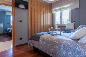 Posteľ alebo postele v izbe v ubytovaní Residencial Vicaño VUT-PO-03856 + 37 fotografií