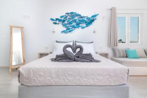 Ein Bett oder Betten in einem Zimmer der Unterkunft Sea House