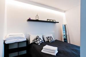 Ένα ή περισσότερα κρεβάτια σε δωμάτιο στο Apartament Centrum