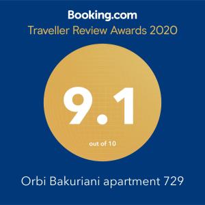 un círculo amarillo con el número. en Orbi Bakuriani apartment 729 en Bakuriani