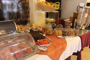 a table with a buffet of food on it at Solar de Mos in Lagos