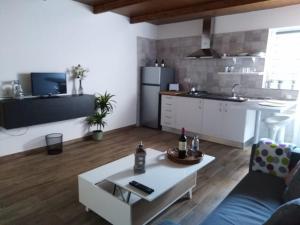 a living room with a couch and a table at Casa Adeyu in Tuineje