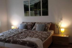 Postel nebo postele na pokoji v ubytování Mia Apartman, Eisenerz