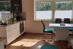 Kuchyň nebo kuchyňský kout v ubytování Mia Apartman, Eisenerz