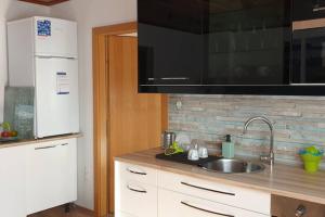 Kuchyň nebo kuchyňský kout v ubytování Mia Apartman, Eisenerz