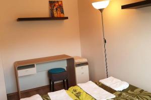 Postel nebo postele na pokoji v ubytování Mia Apartman, Eisenerz