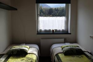 Postel nebo postele na pokoji v ubytování Mia Apartman, Eisenerz