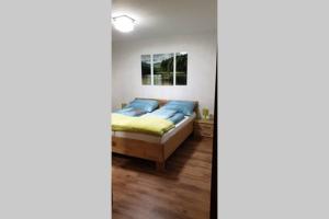 Postel nebo postele na pokoji v ubytování Mia Apartman, Eisenerz