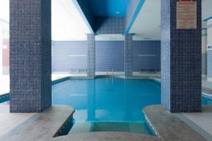Bazén v ubytovaní Residencial Vicaño VUT-PO-03856 alebo v jeho blízkosti