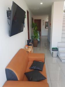 TV a/nebo společenská místnost v ubytování Hotel Esperanza AC