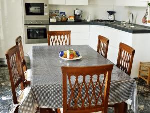 A kitchen or kitchenette at La Casetta di Nonna Pina - Appartamento con cucina in pieno centro