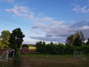 a field with two soccer goals in a yard at Cirkus Hostel Holken in Inkoo