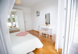 Posteľ alebo postele v izbe v ubytovaní Apartment TIKI with big terrace