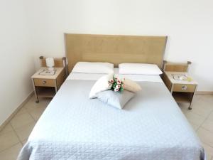 Postel nebo postele na pokoji v ubytování Maresalento Villetta Maria