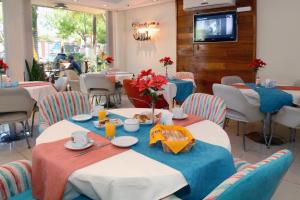 A restaurant or other place to eat at Hotel Capvio