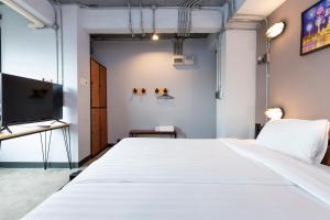 Voodi või voodid majutusasutuse Rest24 Residence toas