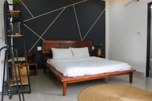Postel nebo postele na pokoji v ubytování Starfruit Villa