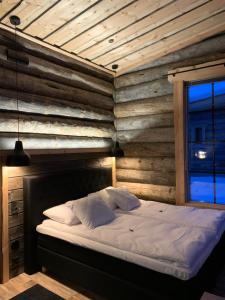 Postel nebo postele na pokoji v ubytování Wilderness Hotel Nangu & Igloos