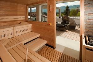 an inside view of a sauna with a patio at EuroParcs Hermagor - Nassfeld in Hermagor