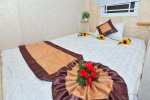 Voodi või voodid majutusasutuse Winny Hotel Ninh Kieu Quay toas