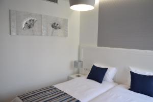 Postel nebo postele na pokoji v ubytování Edificio Charles 202