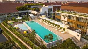 an aerial view of a hotel with a swimming pool at The Aviary Hotel in Siem Reap