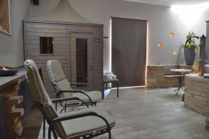 Posedenie v ubytovaní Hotel Via Ironia