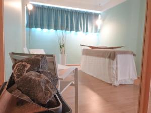 Posteľ alebo postele v izbe v ubytovaní Travini Hotel Residence