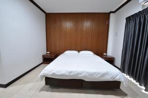 Posteľ alebo postele v izbe v ubytovaní AT TP HOTEL