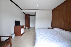 Posteľ alebo postele v izbe v ubytovaní AT TP HOTEL