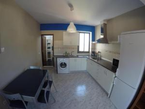 Kuchyň nebo kuchyňský kout v ubytování Apartamento Agáldar + 2 fotografie