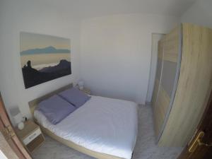 Postel nebo postele na pokoji v ubytování Apartamento Agáldar