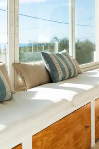 Ένα ή περισσότερα κρεβάτια σε δωμάτιο στο Sea View Cascais Design Villa