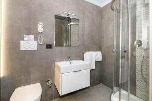 Łazienka w obiekcie Hotel Relais Dei Papi