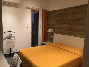Postel nebo postele na pokoji v ubytování Hotel Sul Mare Al Gabbiano