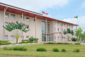 a rendering of the front of a hotel at Ibis Cotonou in Cotonou