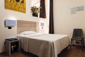 Postel nebo postele na pokoji v ubytování Hotel Fly